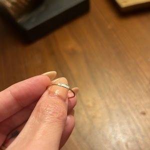 14k gold and diamond stacking ring.   7 small baguette diamonds.